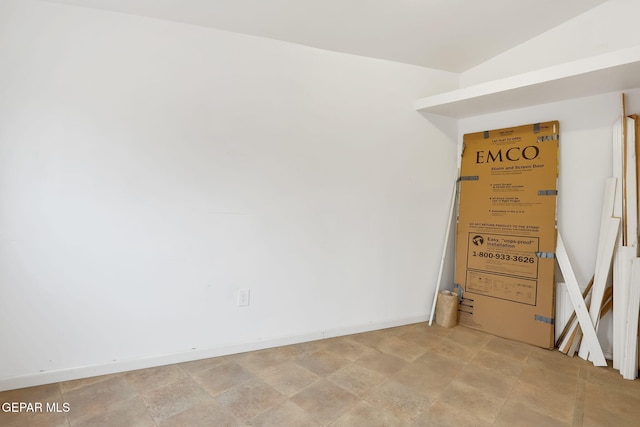 empty room with baseboards