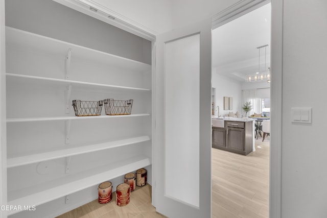 interior space featuring a sink and wood finished floors