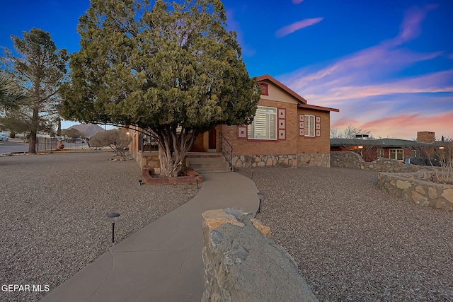 view of front of home with fence