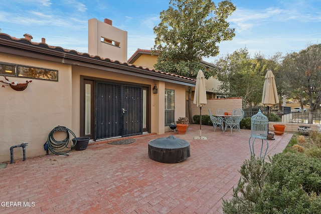 view of patio / terrace featuring outdoor dining space and fence