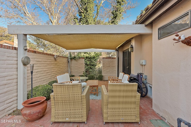 view of patio with a fenced backyard and outdoor lounge area