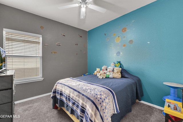 bedroom featuring carpet floors, baseboards, and a ceiling fan