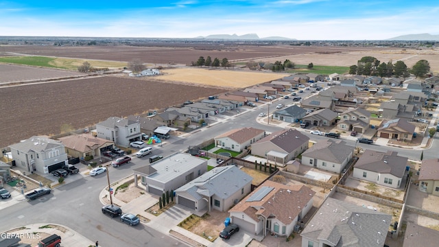 birds eye view of property featuring a residential view and a mountain view