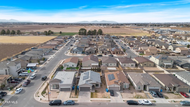 bird's eye view featuring a mountain view and a residential view