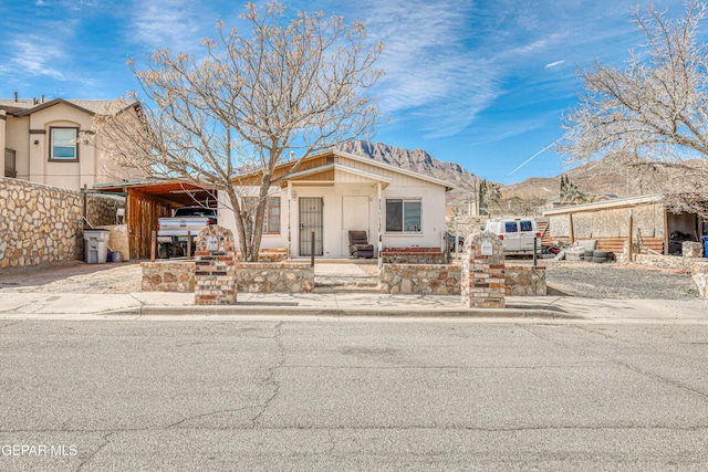 view of front of home featuring a carport