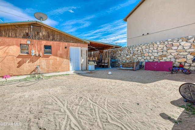 exterior space with stucco siding