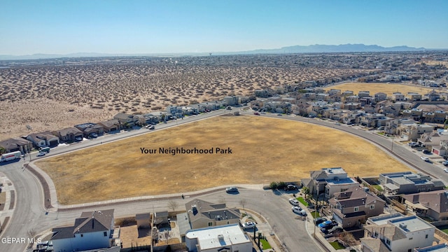 bird's eye view featuring a residential view and a mountain view