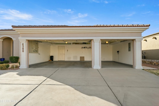 garage featuring driveway