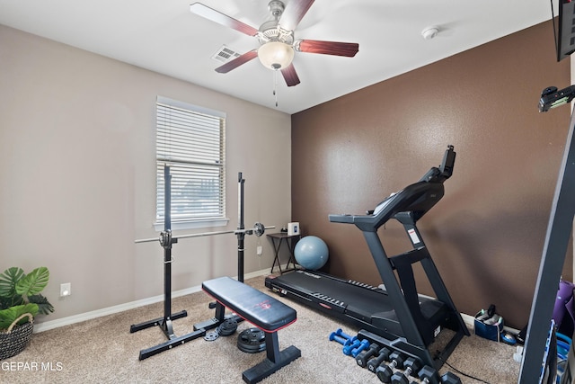 workout area with a ceiling fan, carpet, visible vents, and baseboards