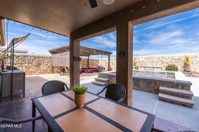 view of patio / terrace featuring a pergola and outdoor dining space