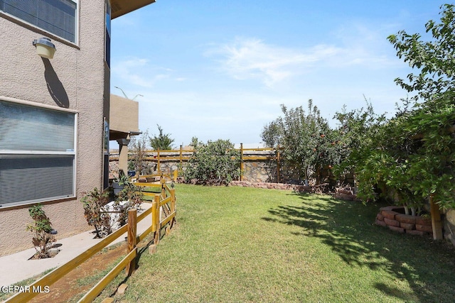 view of yard featuring fence