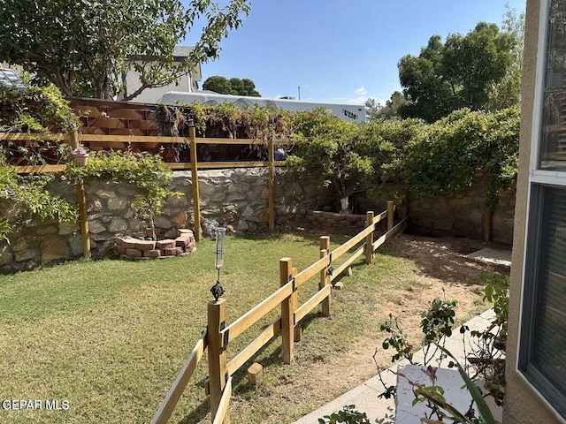 view of yard featuring a fenced backyard