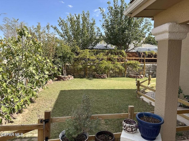 view of yard with fence