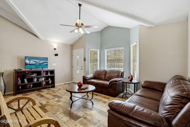 living room featuring light wood-style floors, a ceiling fan, a textured ceiling, beamed ceiling, and baseboards