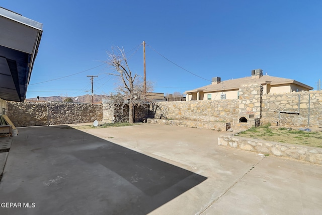 view of patio with a fenced backyard