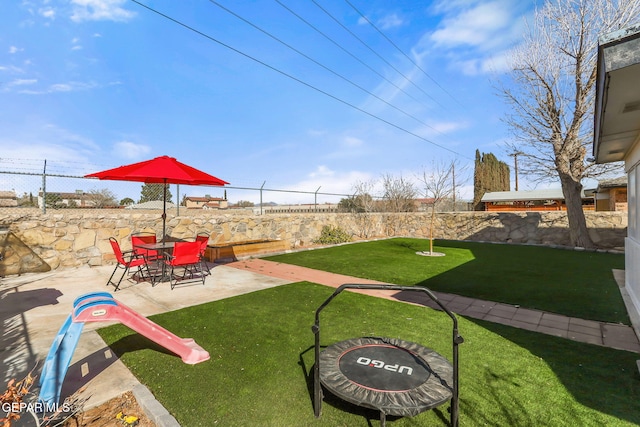 view of yard with a patio area and fence