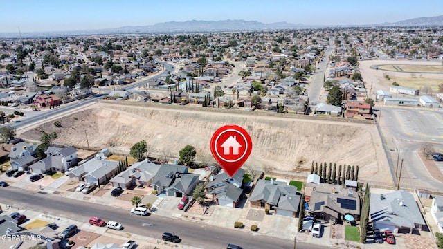 drone / aerial view with a mountain view and a residential view