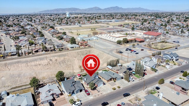 aerial view featuring a residential view and a mountain view