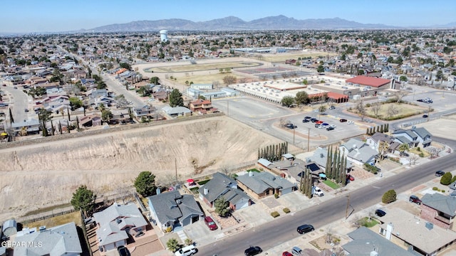 birds eye view of property featuring a residential view and a mountain view