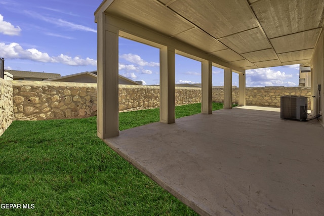 view of patio with central AC unit and fence private yard