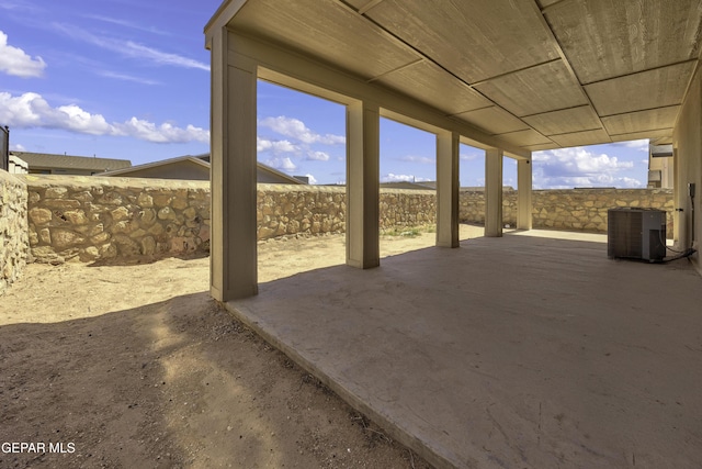 view of patio / terrace featuring central AC unit and a fenced backyard