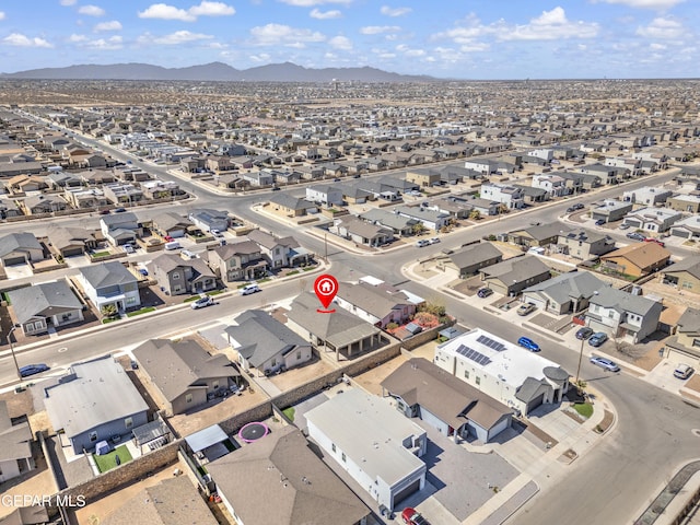 bird's eye view with a residential view and a mountain view