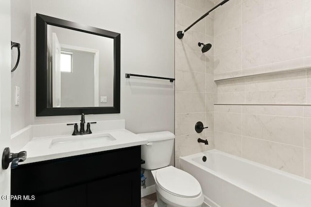 bathroom featuring vanity, toilet, and shower / bath combination