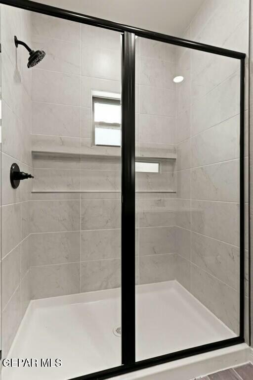 bathroom featuring a stall shower