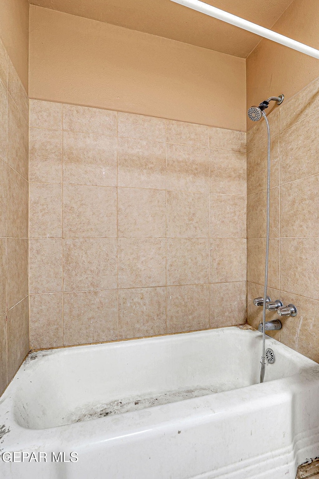 bathroom featuring tub / shower combination