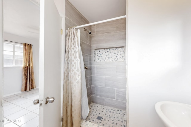 bathroom with a shower stall