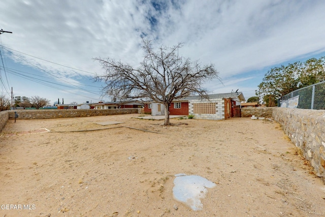 view of yard featuring fence