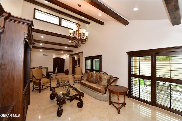 living room featuring arched walkways, plenty of natural light, beam ceiling, and a notable chandelier