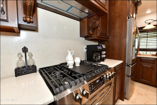 kitchen with stainless steel appliances and light countertops