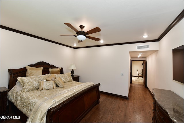 bedroom featuring a ceiling fan, visible vents, baseboards, ornamental molding, and dark wood finished floors