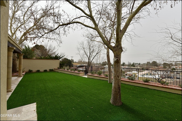 view of yard featuring fence