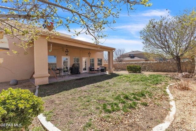 view of yard featuring a patio and fence