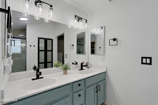 bathroom featuring double vanity and a sink