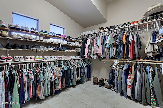 spacious closet with vaulted ceiling