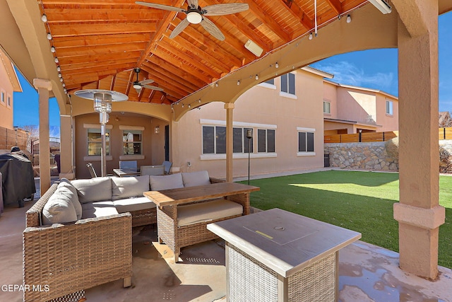 view of patio with ceiling fan, fence, and an outdoor hangout area