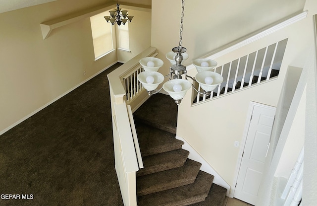 1513 Prickley Pear Dr, El Paso, TX 79912 - staircase featuring carpet flooring, a chandelier, baseboards, and vaulted ceiling
