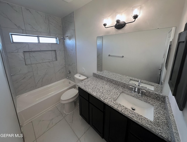 bathroom with marble finish floor, vanity, toilet, and bathtub / shower combination