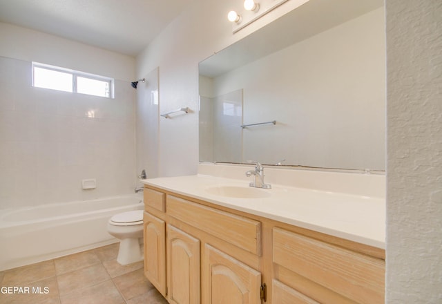 bathroom featuring vanity, toilet, shower / tub combination, and tile patterned flooring