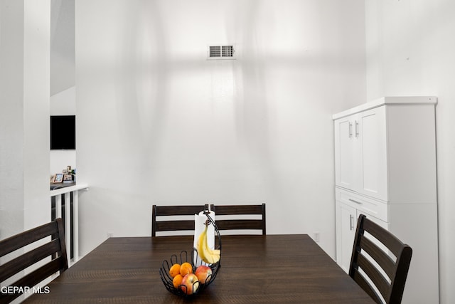 dining space featuring visible vents