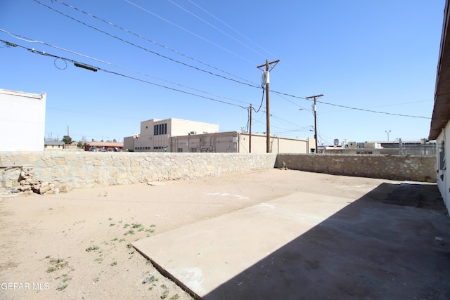 view of yard with a patio area and a fenced backyard