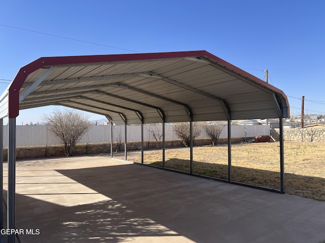 225 Peyton Rd, El Paso, TX 79928 - view of parking featuring a detached carport and fence