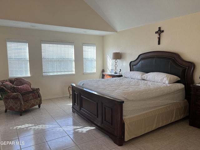 225 Peyton Rd, El Paso, TX 79928 - bedroom featuring vaulted ceiling, light tile patterned floors, and baseboards