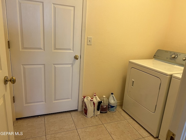 225 Peyton Rd, El Paso, TX 79928 - washroom with washing machine and dryer and light tile patterned flooring