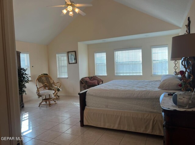 225 Peyton Rd, El Paso, TX 79928 - bedroom with multiple windows, light tile patterned floors, high vaulted ceiling, baseboards, and a ceiling fan