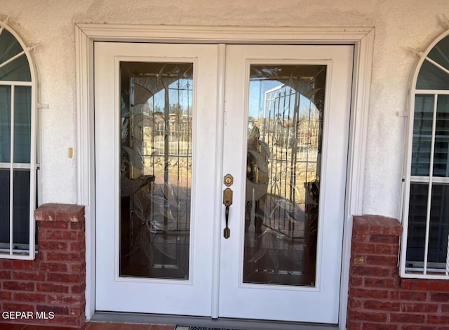 225 Peyton Rd, El Paso, TX 79928 - doorway to property featuring brick siding
