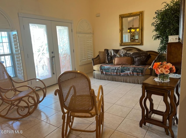 225 Peyton Rd, El Paso, TX 79928 - living area with light tile patterned floors and french doors